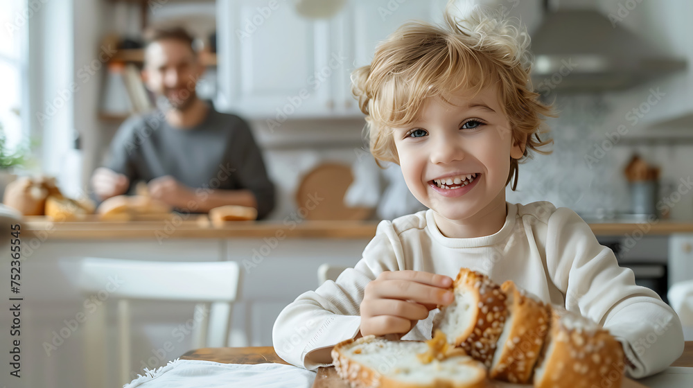 Happy kid and good testy bread in kitchen Happy kid and good testy bread in kitchen