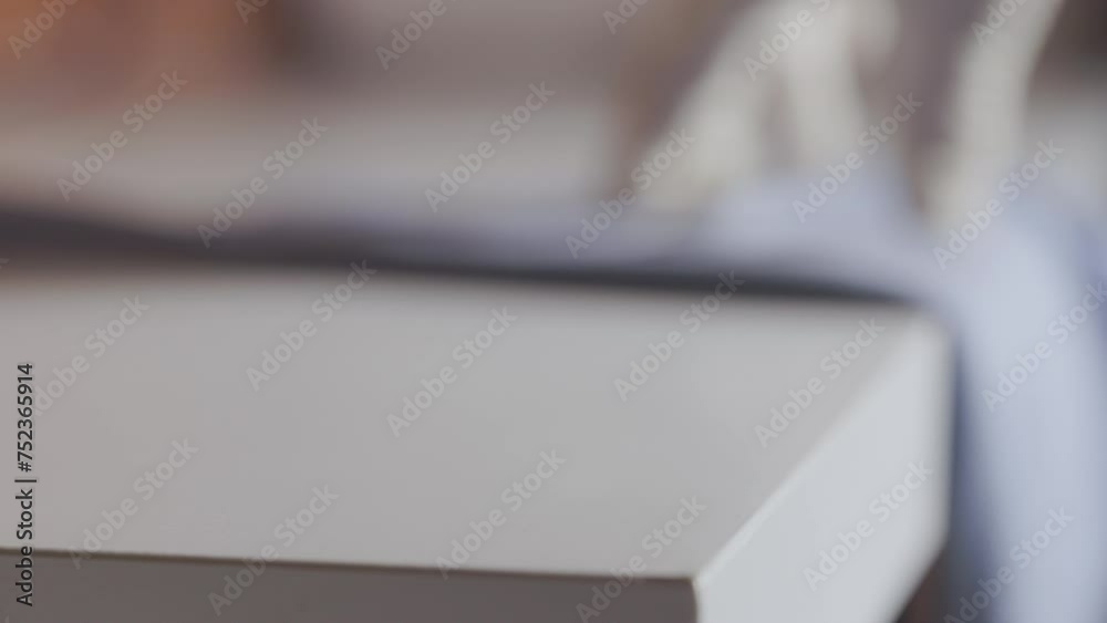 Wiping white table with rag Wiping white table with rag
