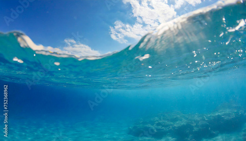 水中から見た青い海と海面（AI生成画像） © Laxmico