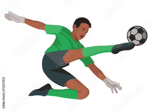 Nigerian teenager boy football goalkeeper in green sports gear kicks the ball with his foot