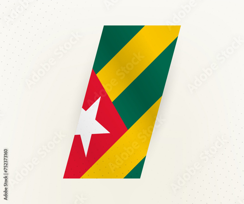Abstract modern vertical flag of Togo on beige background with dots.