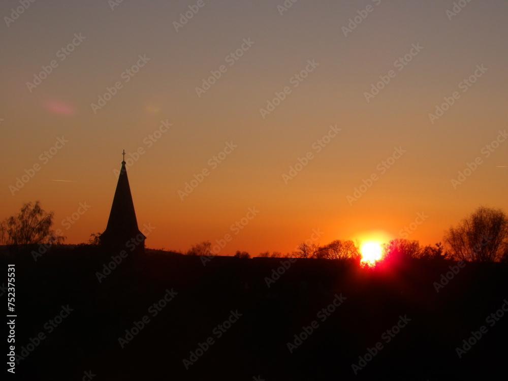 Church steeple at sunset