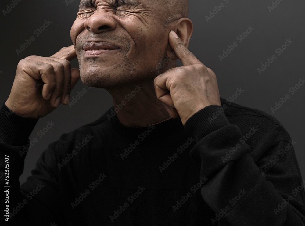 deaf man suffering from deafness and hearing loss on grey background with people stock image stock photo deaf man suffering from deafness and hearing loss on grey background with people stock image stock photo