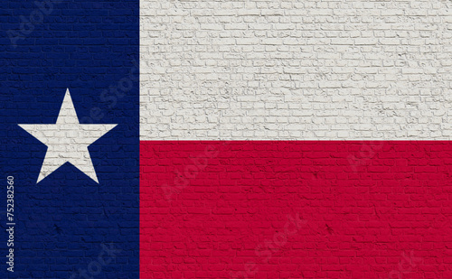 Texas flag colors painted on a brick wall. National colors, state, country, banner, government, Texian culture, politics. photo
