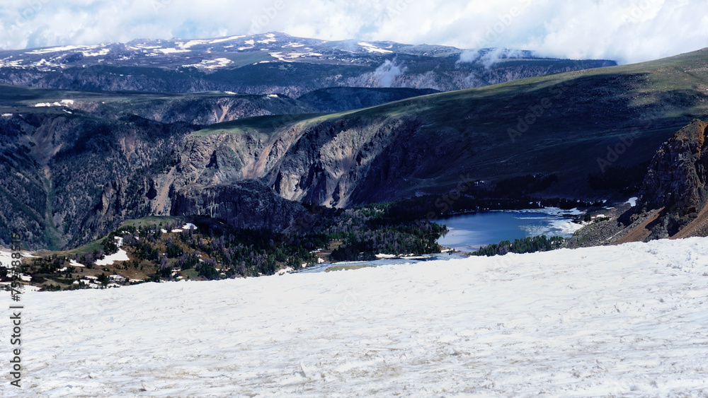 Snow activities in Wyoming. Wonderful and only summer ski area. Spectacular view at Beartooth Highway Summit, Wyoming. A Drive of incredible beauty. Yellowstone. Northwest alpine landscape. Road trip.
