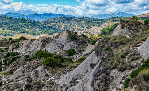 view of Aliano badlands (calanchi), landscape made of clay sculptures eroded by the rainwater, Basilicata region, southern Italy