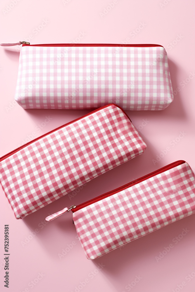 Cosmetic pouches in various sizes featuring gingham patterns сreated with Generative Ai Cosmetic pouches in various sizes featuring gingham patterns сreated with Generative Ai