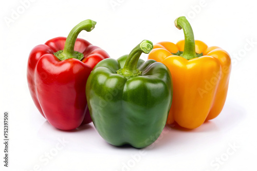 red yellow and green peppers isolated in white