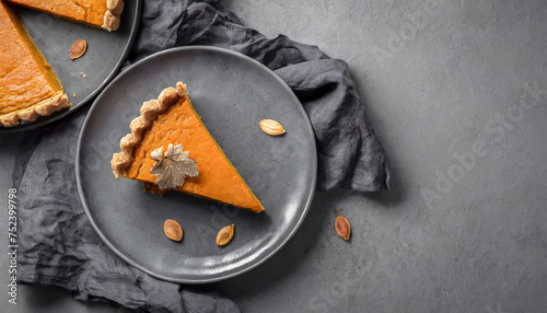 Pumpkin pie. top view of pumpkin pie on grey plate, copy space