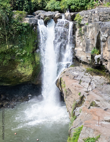 Waterfall  typical of Bali in the forest  drone photo in summer