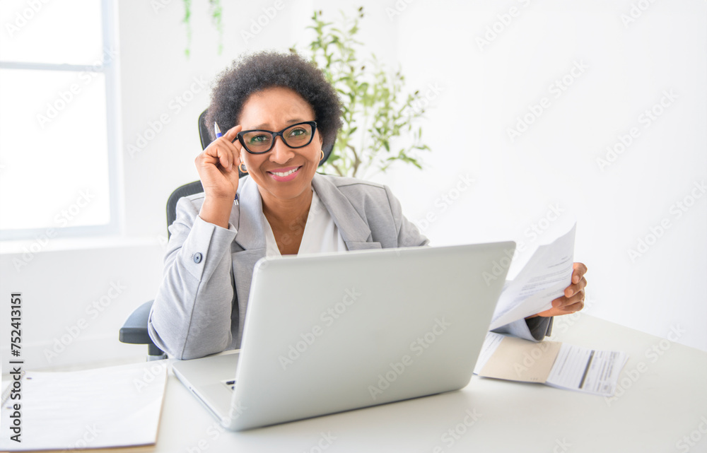 nice Portrait of an black business woman sit at the office nice Portrait of an black business woman sit at the office
