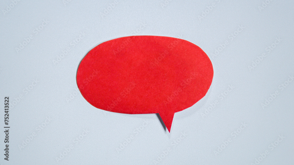 Red paper speech bubble on white background. Blank space that can be added text. Red paper speech bubble on white background. Blank space that can be added text.