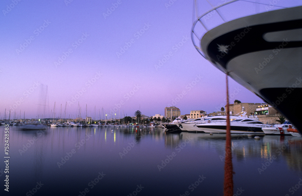 boats at the dock at sunset, Portof Alghero, Sardinia, Italy