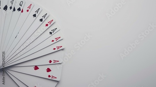 Deck of playing cards fanned out elegantly against a pristine white backdrop, ready for a night of thrilling card games.