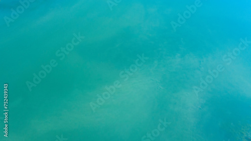 Surface of the blue water of a lake. Ideal for sea and ocean texture and pattern.