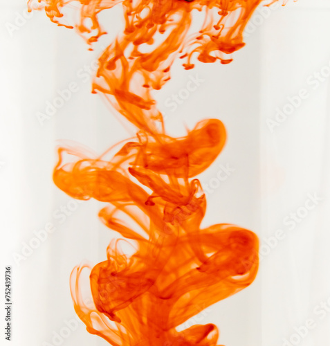 Orange paint in water