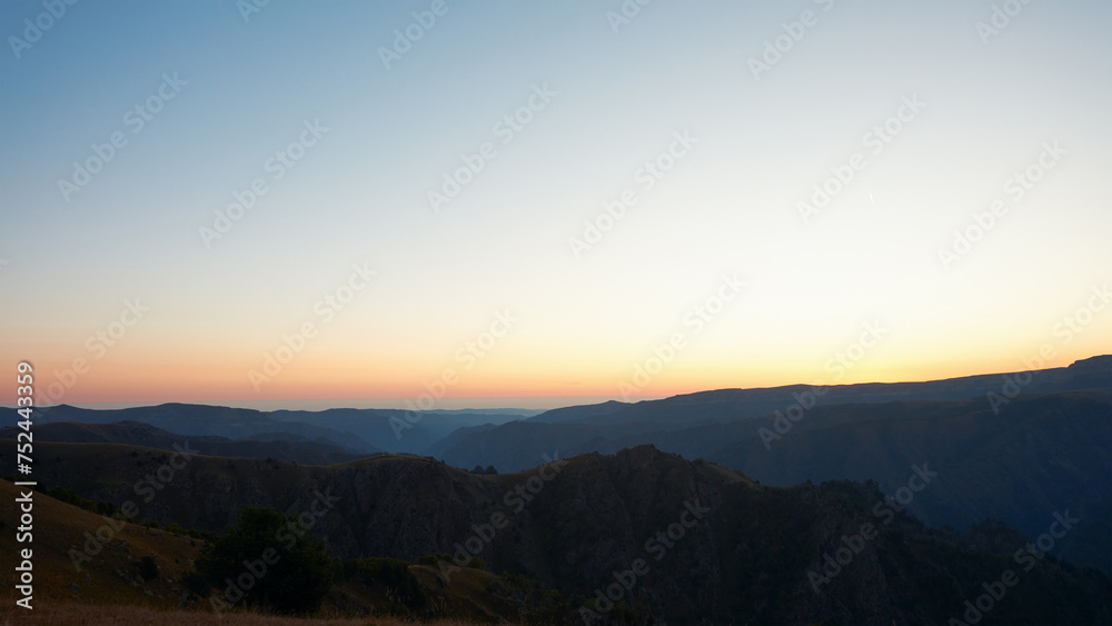 Mountain landscape at sunset. Background image.