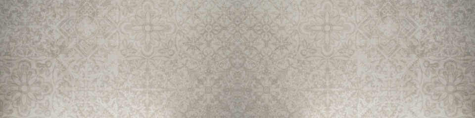 Old gray gray white vintage shabby floral flowers patchwork motif tiles stone concrete cement wall texture background banner wallpaper pattern.