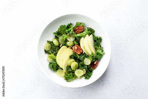 Green high fiber kale and apple salad, overhead view