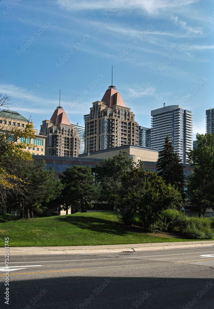 Obraz premium Mississauga high buildings and streets on a typical summer day. A view of skyscrapers in downtown Mississauga.