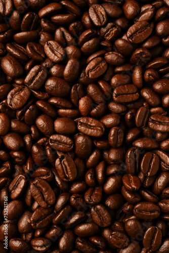 Aroma brown roasted coffee beans. Arabica, food background.
