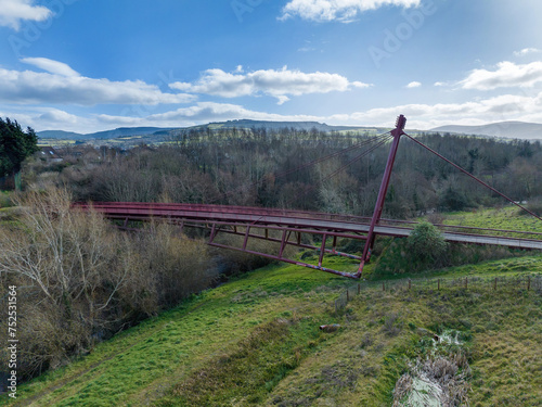 footbridge over the river dodder at dodder riverbank park, dublin, ireland