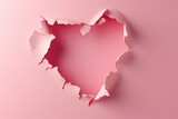 Heart-shaped hole on pastel pink background. Creative copy space. Aesthetic concept of folling in love.