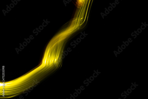 Abstract art. Light painting in the dark. Abstract lines of light.