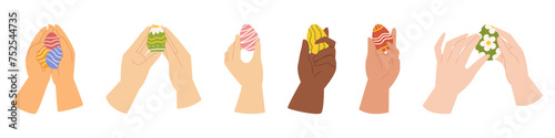 Collection with different hands that are holding easter painted eggs.