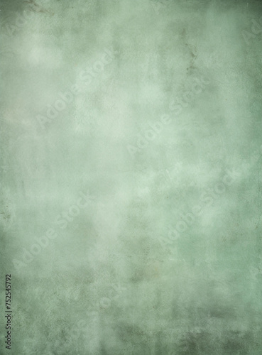 Abstract sage green blurred background for portrait. Portrait backdrop for studio. Empty wall.