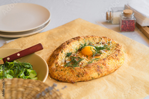 Wallpaper Mural Homemade khachapuri with egg and herbs close-up Torontodigital.ca