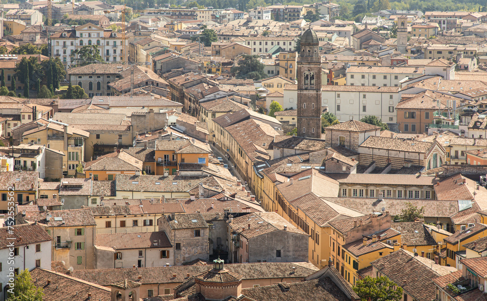 View of houses and tiled roofs in city center of Verona; Urban scene in Italy