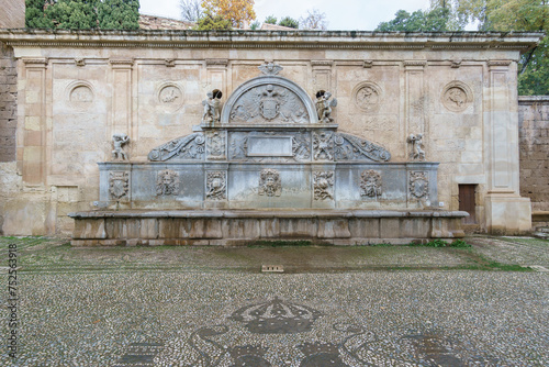 Fountain Pilar de Carlos V next to the Puerta de la Justicia of Alhambra, Granada, Andalusia, Spain photo