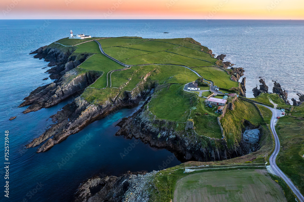 Sunset scene at Galley Head Lighthouse in County Cork Ireland