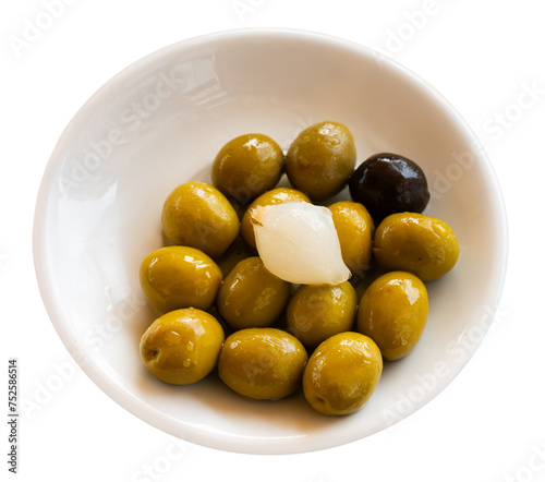 Image of green, black olives and onion, beautiful presentation of dish. Isolated over white background