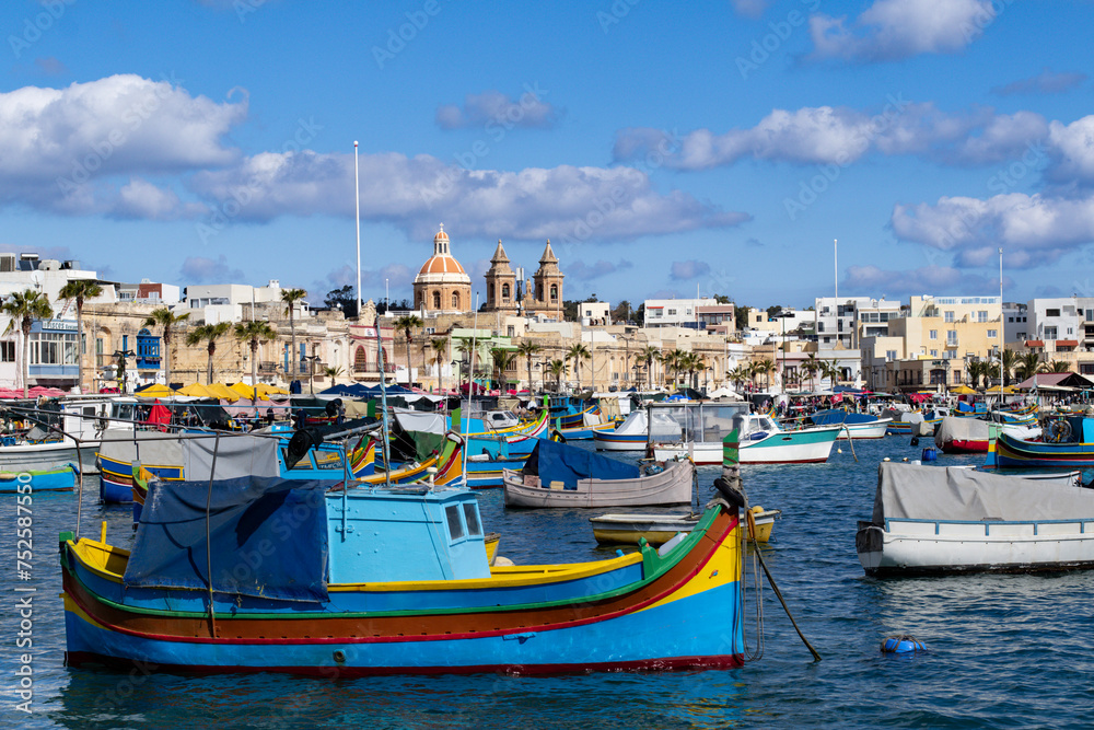 A boat and the city,
Marsaxlokk Malta 