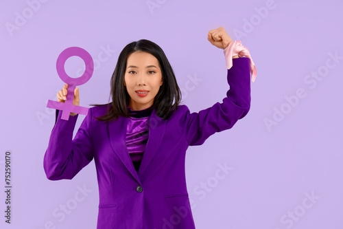 Young Asian woman with gend...
