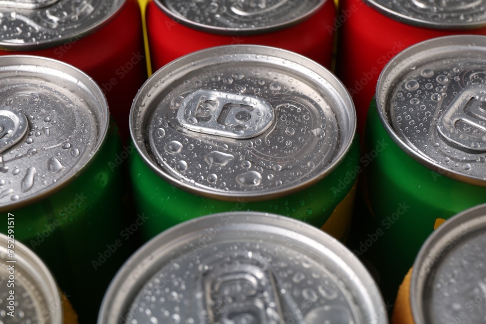 Energy drinks in wet cans, closeup. Functional beverage Energy drinks in wet cans, closeup. Functional beverage