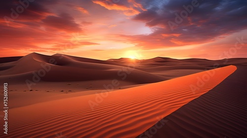 Sunset over the sand dunes of the Sahara desert in Morocco © A