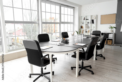 Interior of office with table prepared for meeting © Pixel-Shot