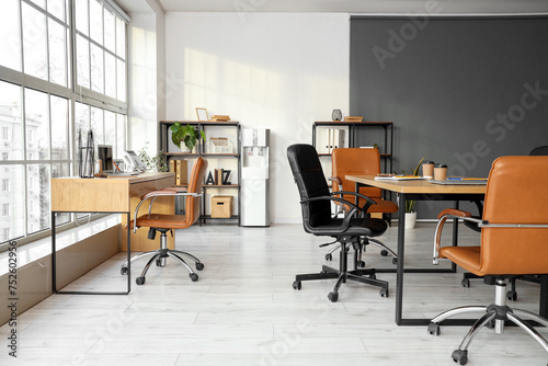 Interior of office with tables prepared for business meeting © Pixel-Shot