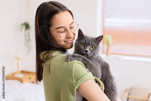 Happy young woman with cute...