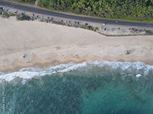 Beach and shoreline road at in Kekaha on Kauai photo