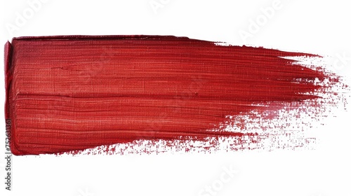 Vibrant red paint stroke isolated on white background for creative design projects photo