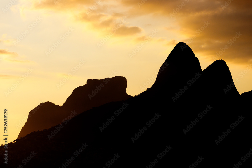 silhouette of Two Brother Hill and Gavea Stone in Rio de Janeiro.
