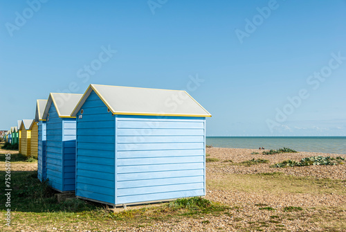 Colorful huts at the beach, East Sussex, England. © wonder