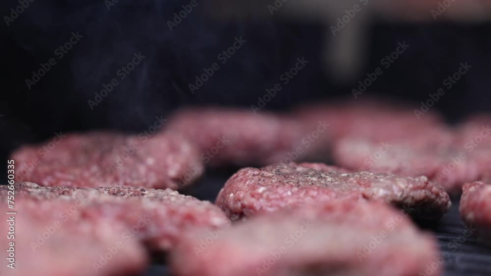 Rack Focus Moving Over Hamburger Patties Cooking On Hot Grill Slow Motion Rack Focus Moving Over Hamburger Patties Cooking On Hot Grill Slow Motion