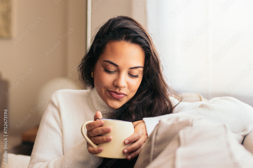 Enjoying Morning at Home: Young Woman Drinking Coffee Enjoying Morning at Home: Young Woman Drinking Coffee