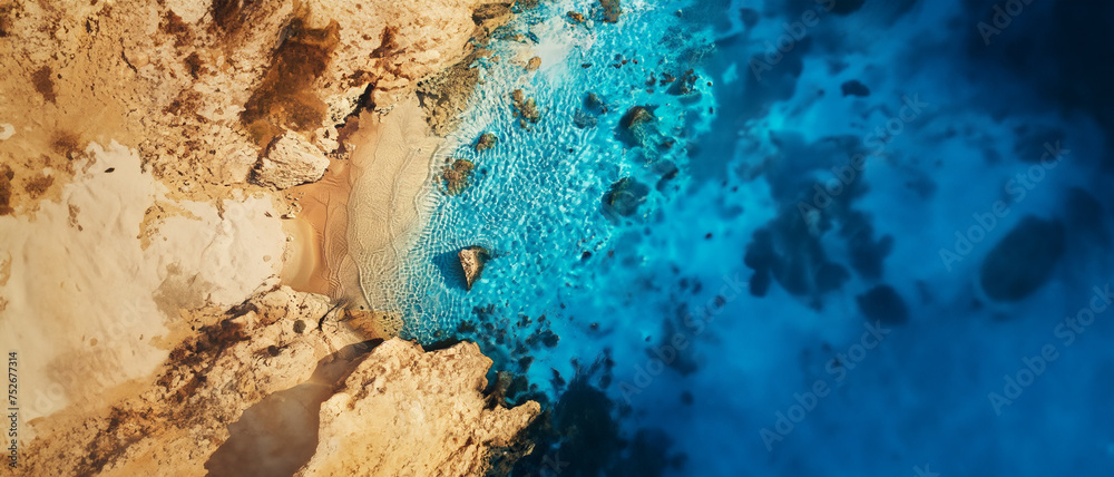 Aerial View of Beach and Ocean Water with Rocks Aerial View of Beach and Ocean Water with Rocks