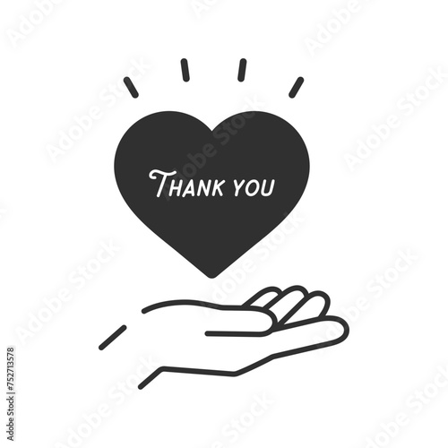 Thank Youの文字と黒いハートを持っている人の手 - ありがとう･感謝の気持ちのイメージ素材